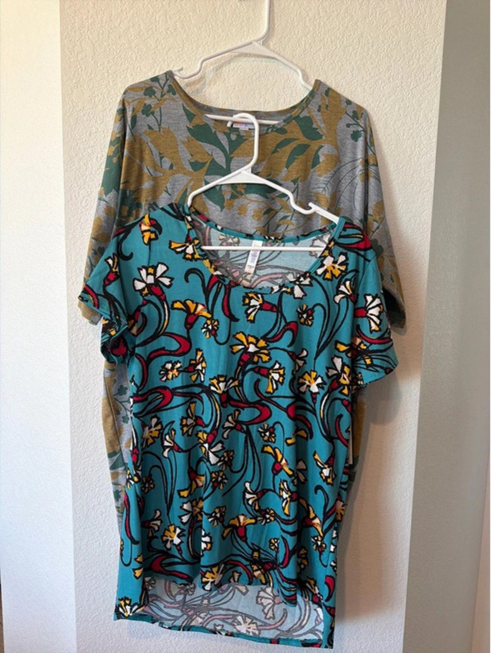 What of two Lula Ro women’s size large T-shirts?